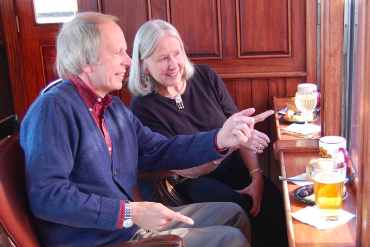 a man and a woman sitting at a table