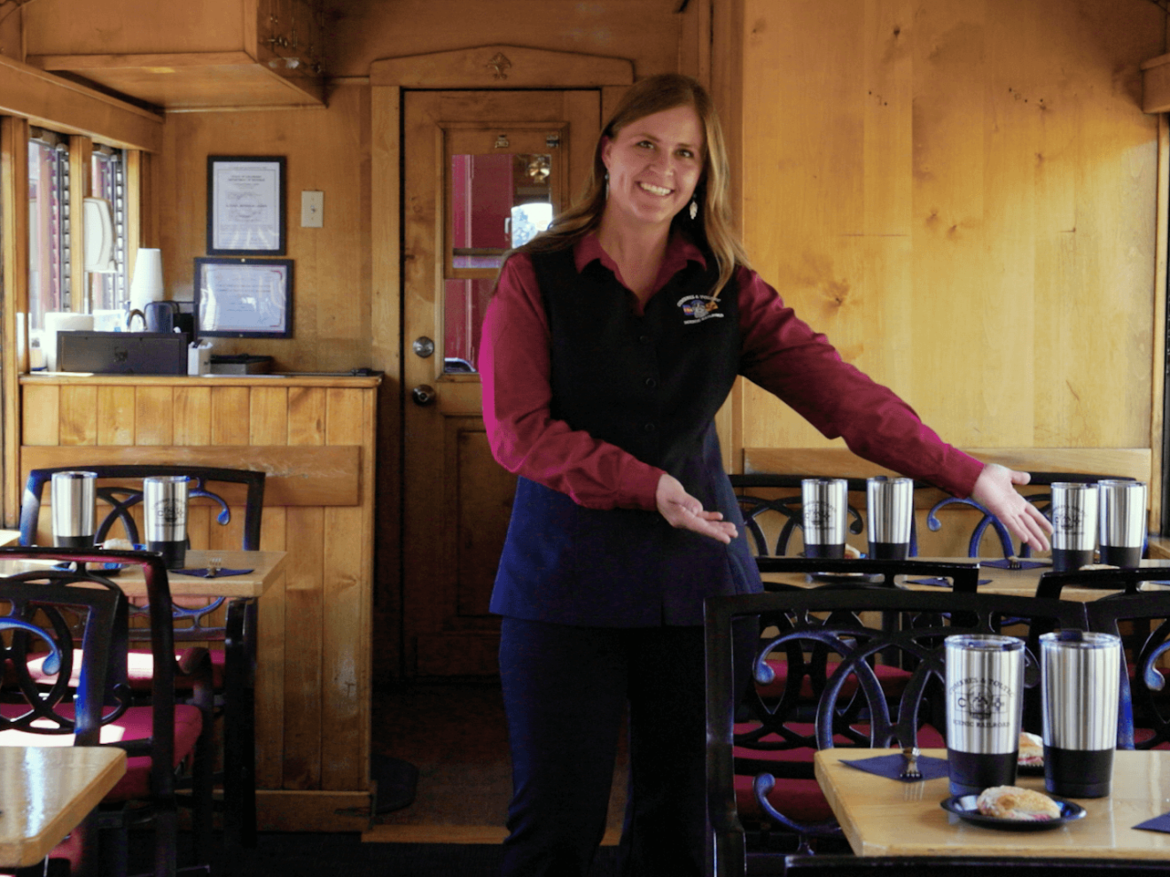 a man and a woman standing in a kitchen
