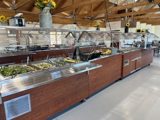 a large kitchen with stainless steel appliances