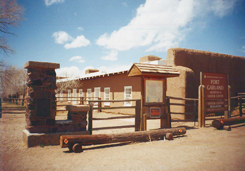 a truck is parked on the side of a building