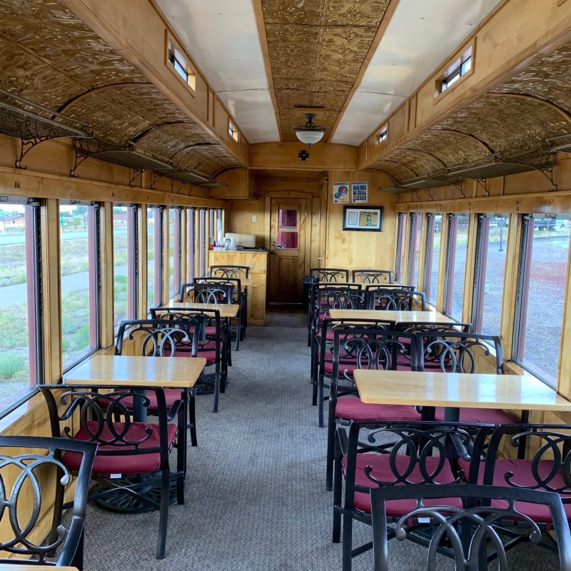 a group of people sitting at a train station