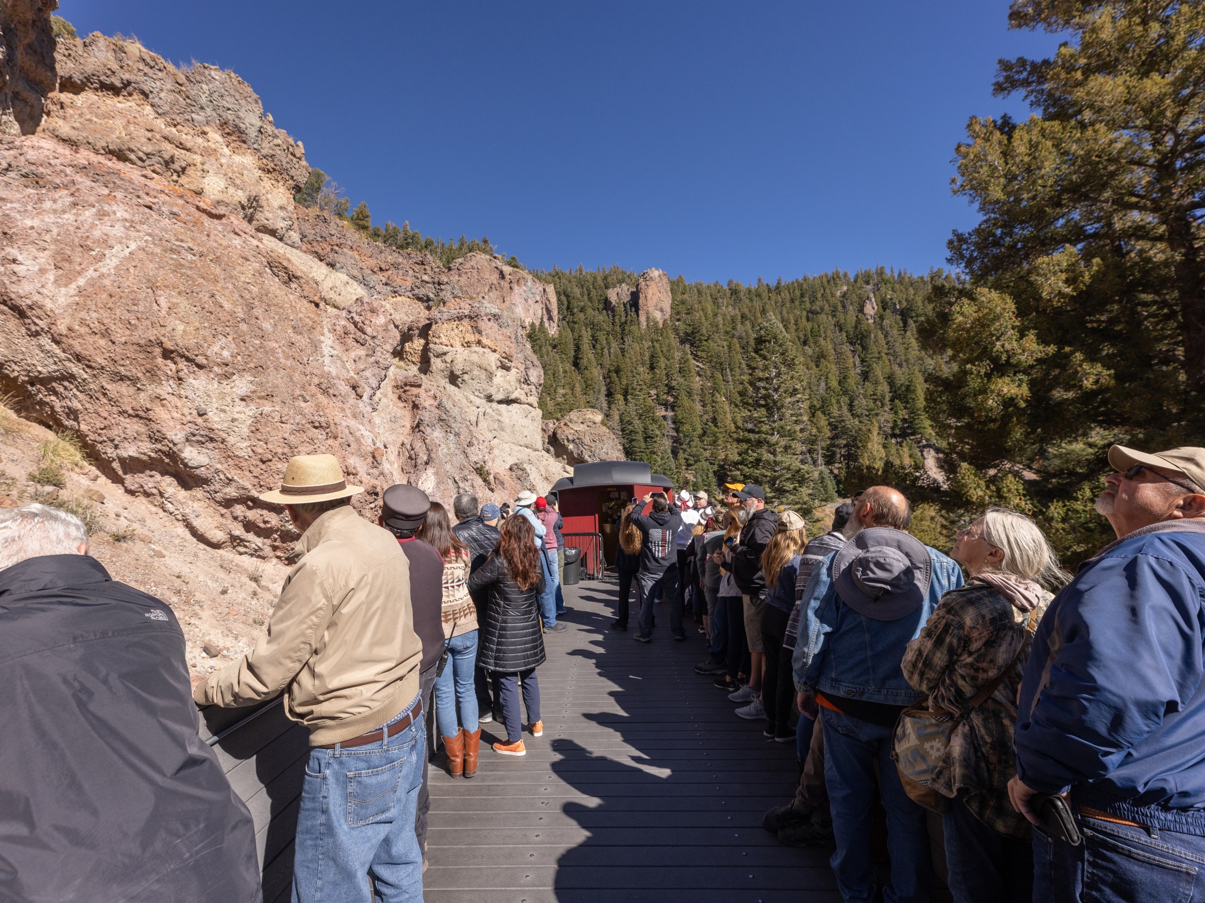 Guests viewing rock formations from Gondola on Cumbres & Toltec Scenic Railroad.
